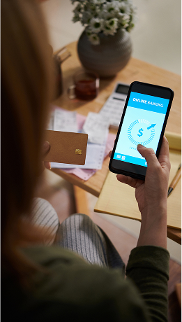 A patient accesses their Memorial MRI patient portal from their cell phone to pay for their diagnostic imaging exam