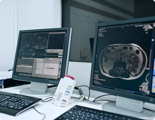group-doctors-listening-medical-expert-medical-conference Computers displaying MRI brain scans sit on a table inside an MRI scanning room at a diagnostic imaging center in Texas